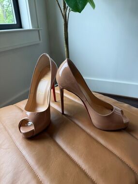 Christian Louboutin Nude Patent Peep-Toe Stilettos with Red Soles